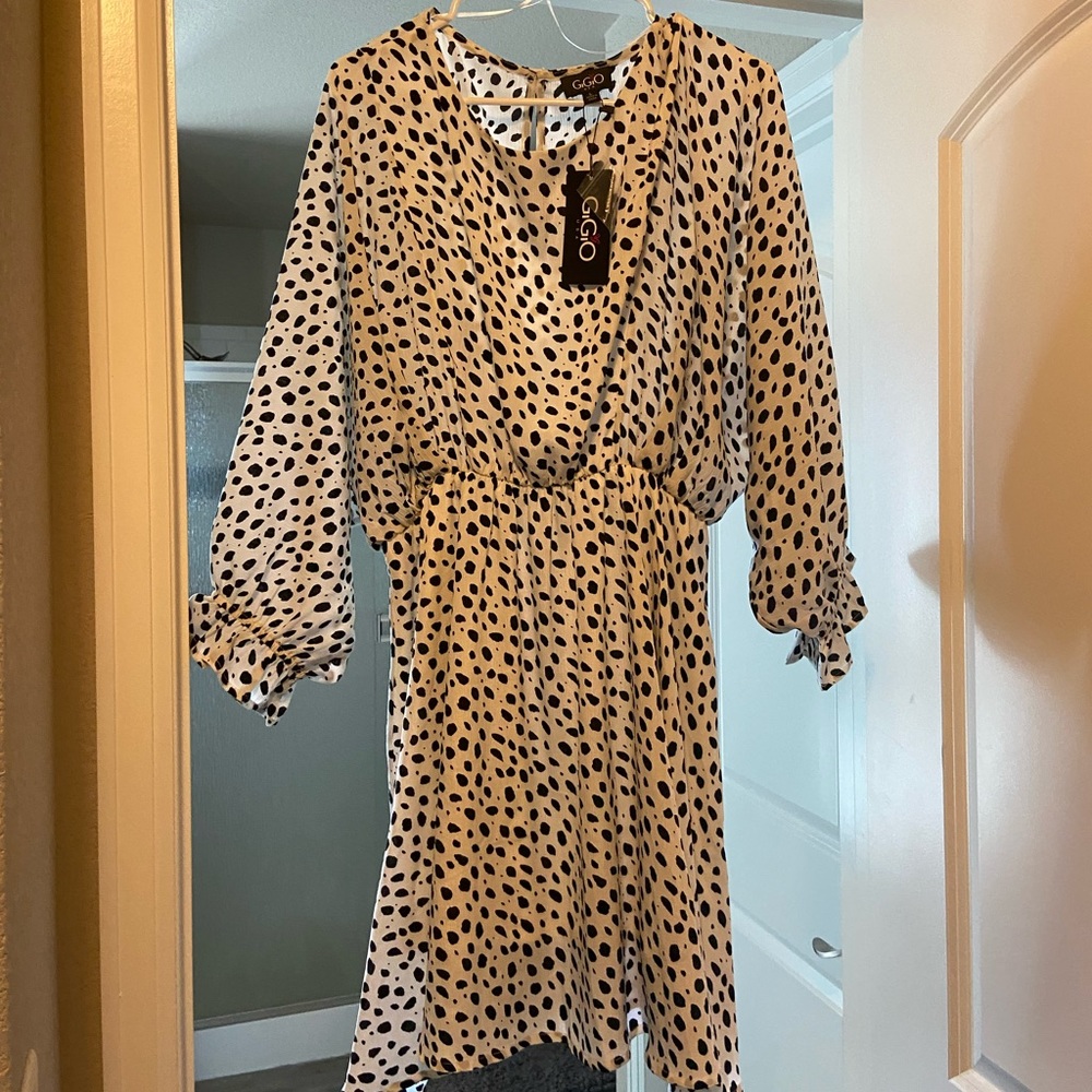 Women’s white and black dot print dress